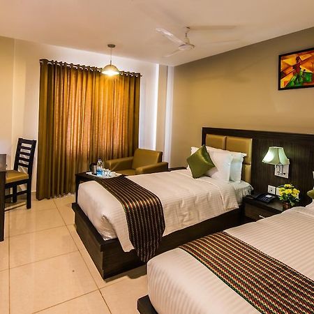 Plaza Hotel Trichy Tiruchirappalli Rom bilde