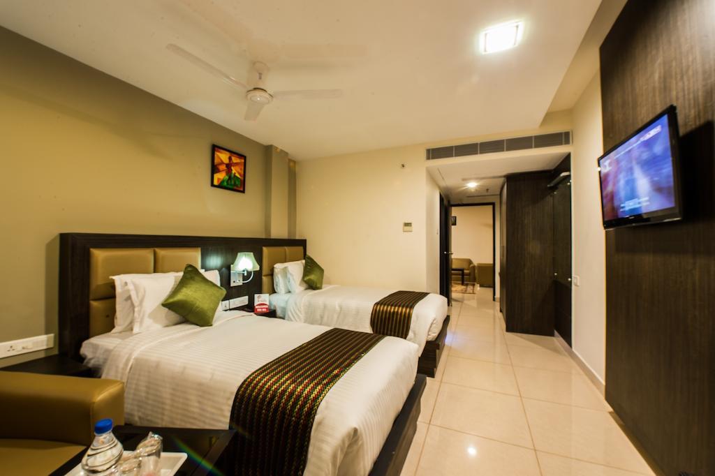 Plaza Hotel Trichy Tiruchirappalli Rom bilde